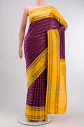 Purple Kanchipuram Silk Saree with Stripes on the body and Zari Border displayed on a mannequin
