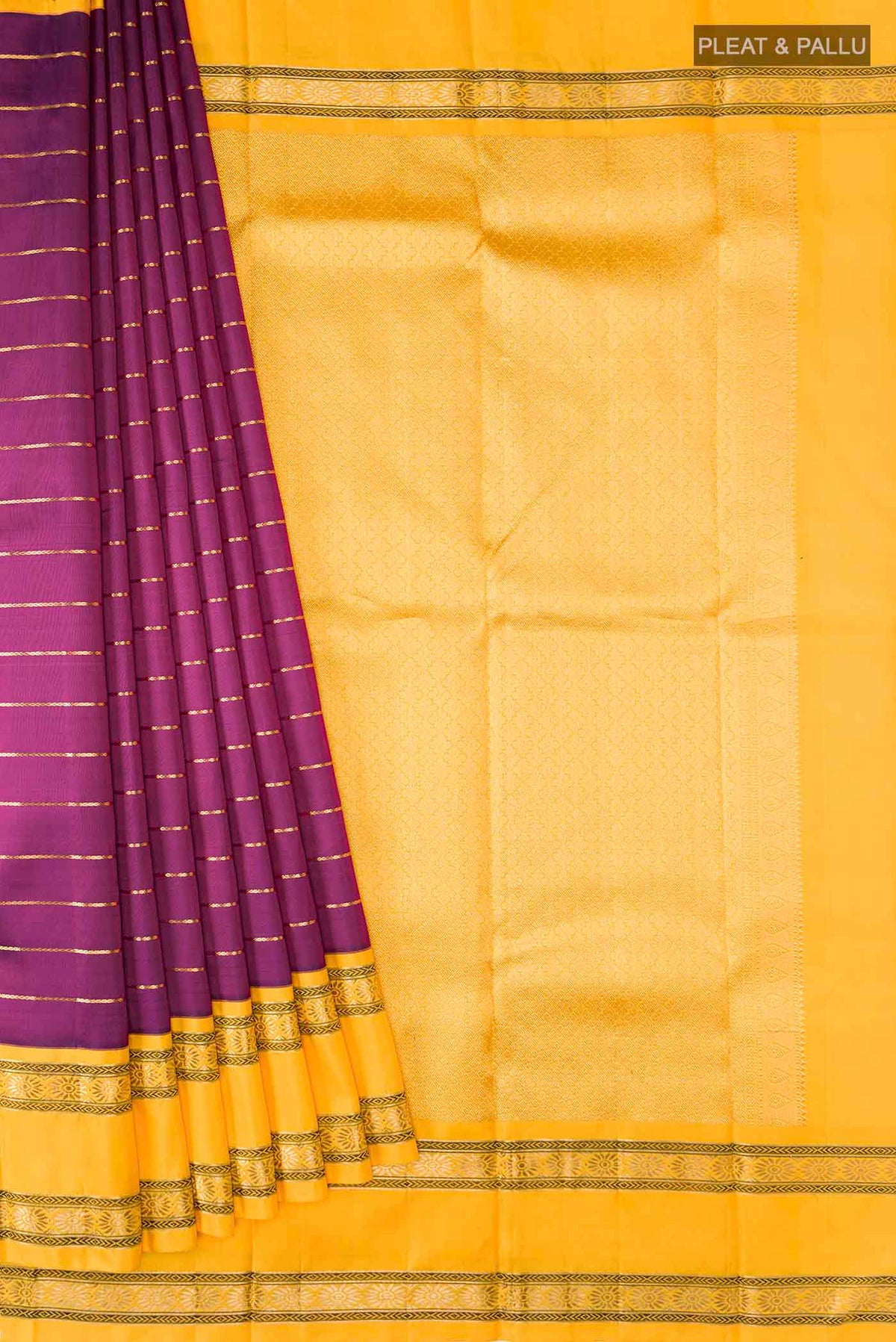 Pleats and pallu of Purple Kanchipuram Silk Saree with Stripes on the body and Zari Border