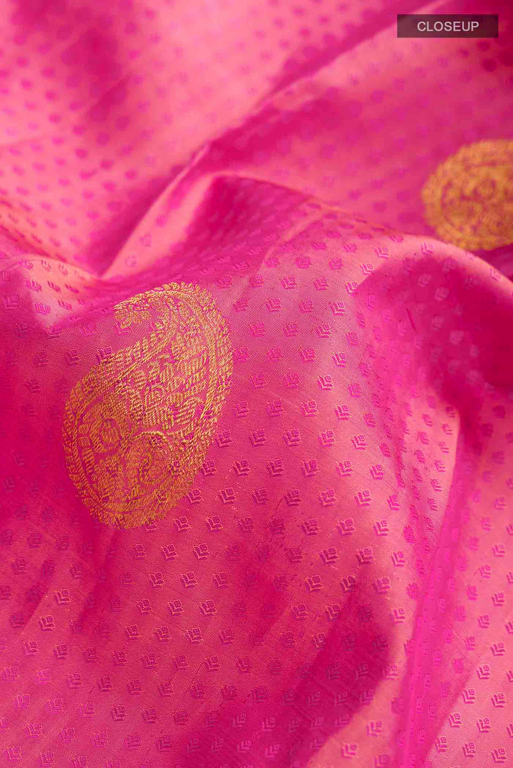 Close up of Multicolor Kanchipuram Silk Saree with Jacquard With Zari Butta on the body and Zari Border displaying folds