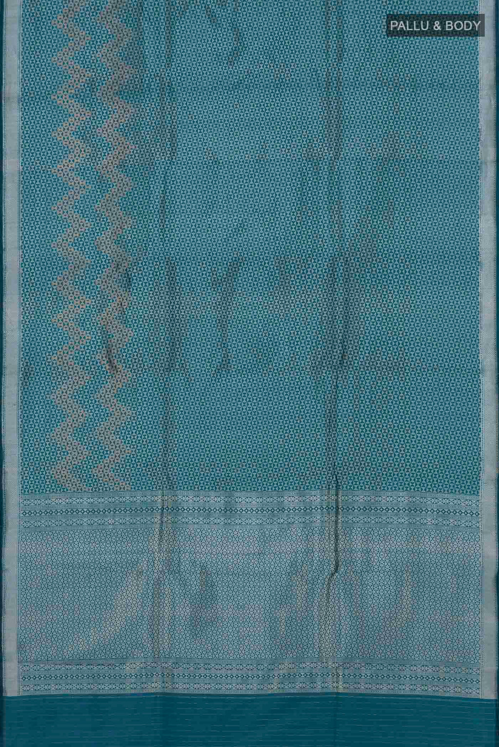 Flat view of Turquoise Banarasi Katan Silk Saree with Zari Brocade on the body and Zari Border