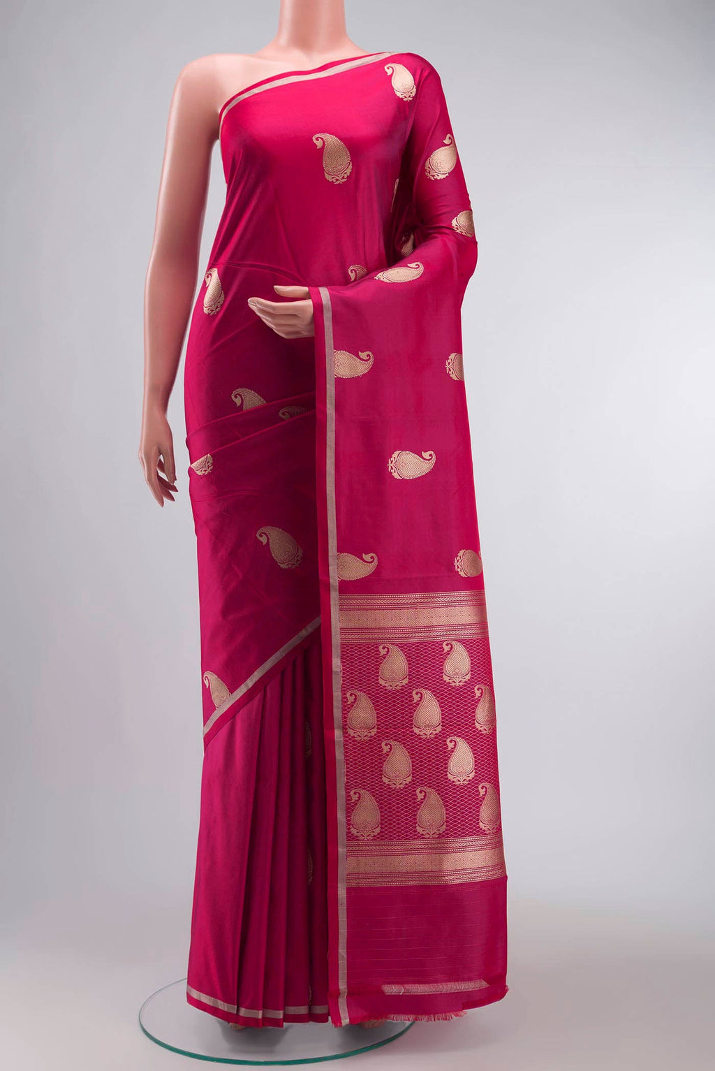 Pink Banarasi Silk Saree with Zari Butta on the body and Zari Border displayed on a mannequin