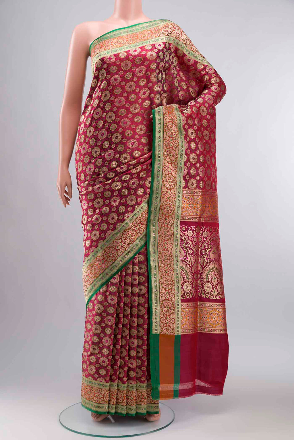 Pink Banarasi Silk Saree with Jacquard With Zari Butta on the body and Zari Border displayed on a mannequin