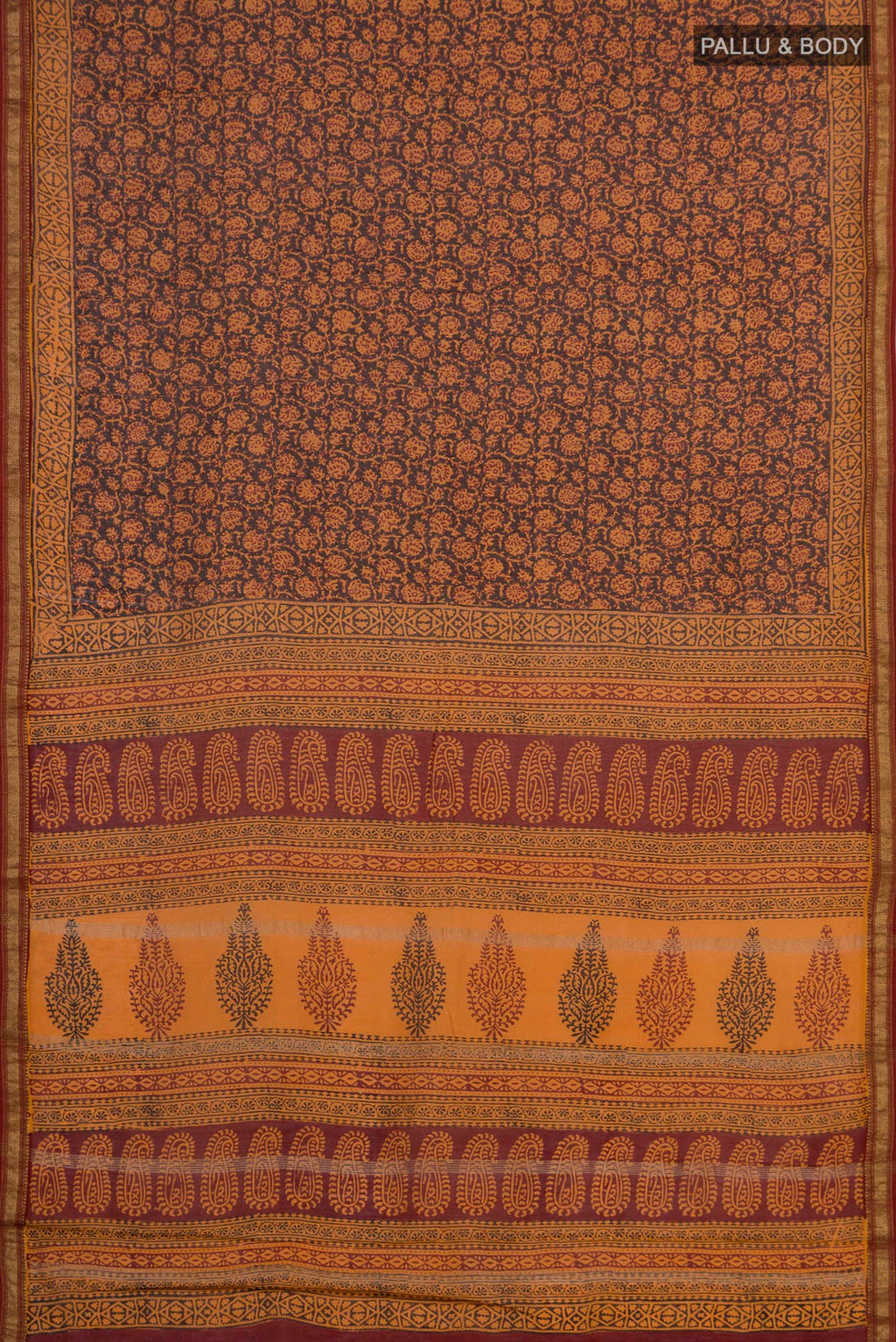 Flat view of Brick Orange Maheshwari Silk Cotton Saree with Printed design on the body and Zari Border. 