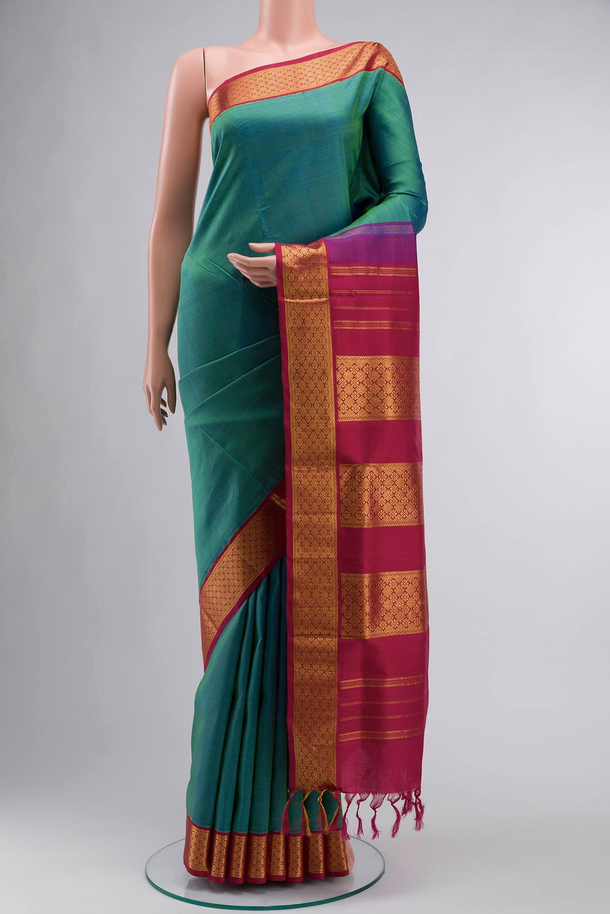 Blue Kanchipuram Silk Nine Yards Saree with Plain Body and Zari Border displayed on a mannequin