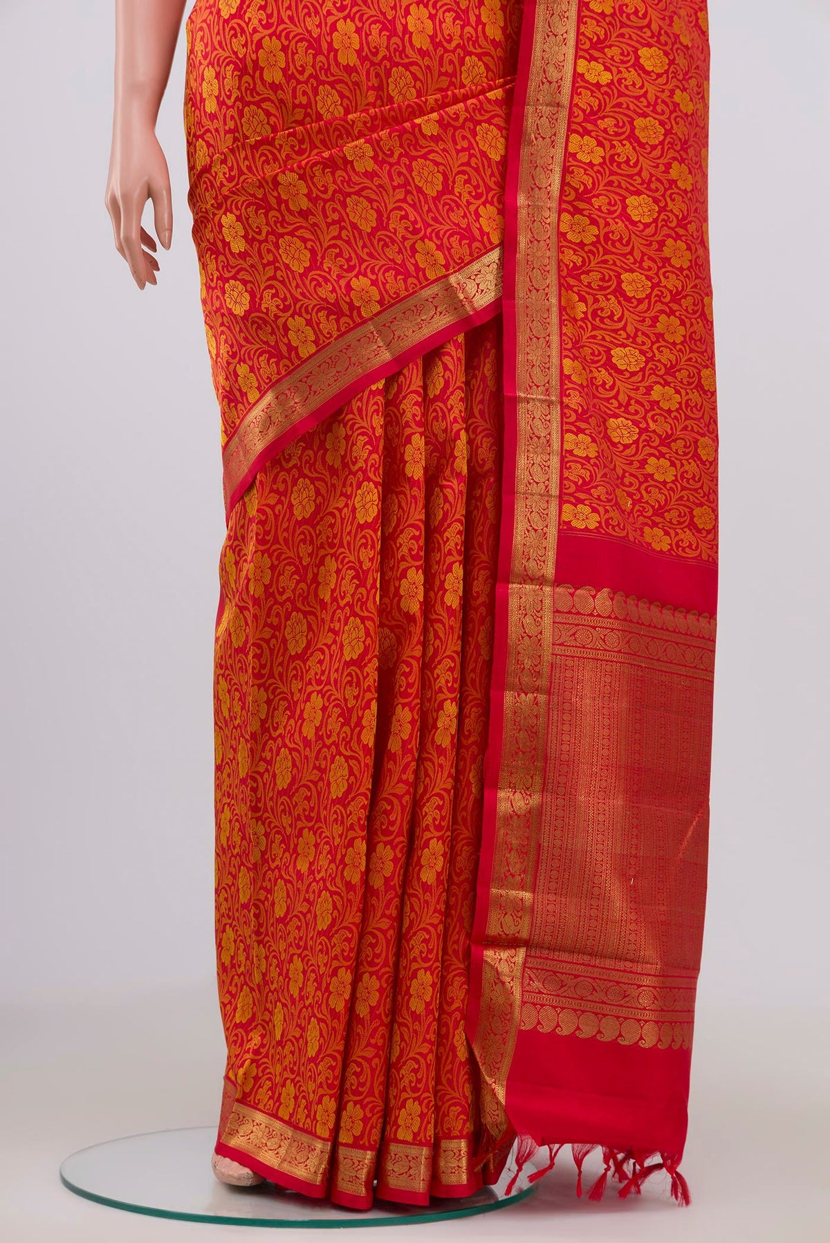 Pleats and pallu of Pure Silk Pure Zari Red Kanjivaram Saree with Jacquard design on the body and Zari Border. 