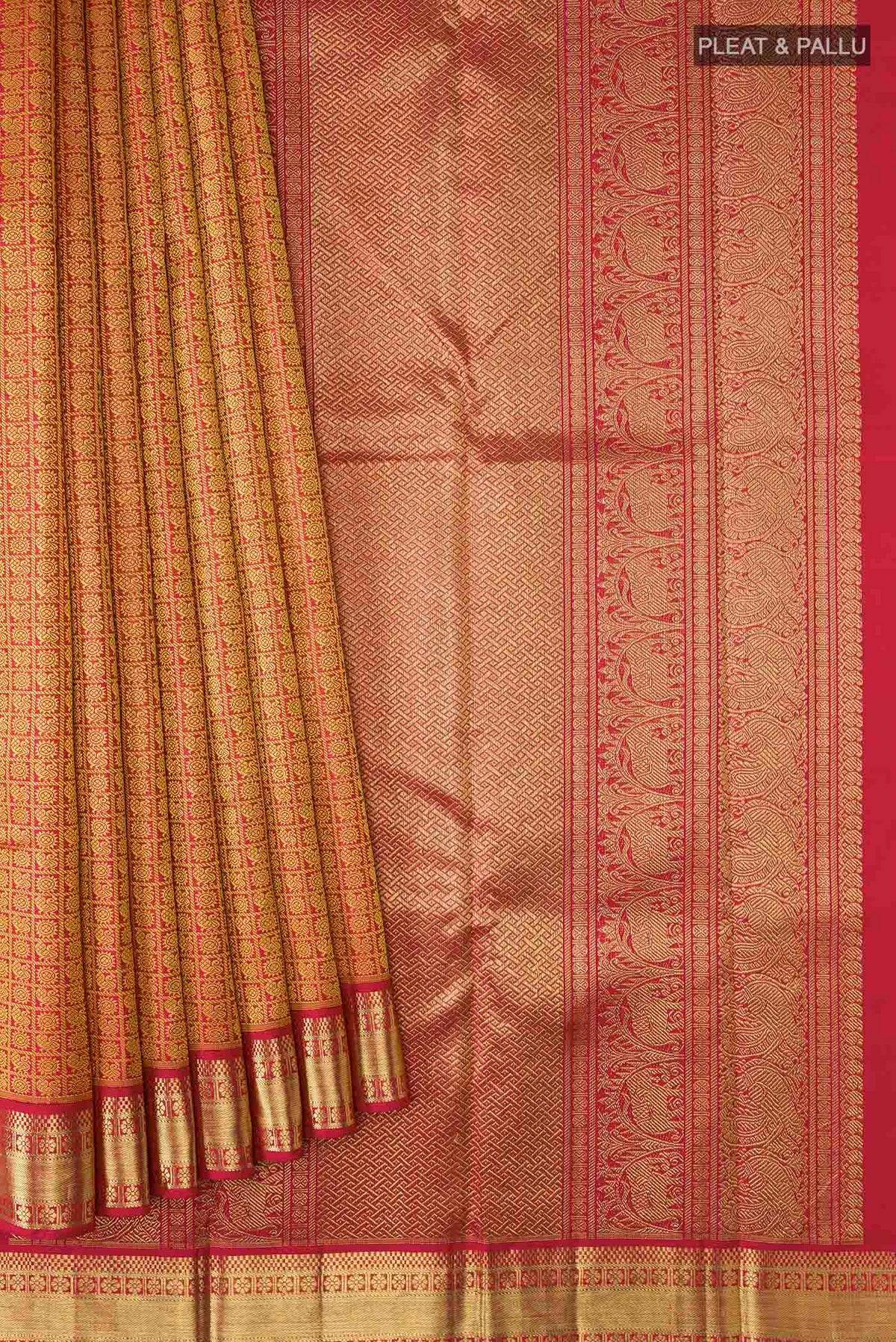 Pleats and pallu of Maroon Kanchipuram Silk Saree with Jacquard design on the body and Zari Border