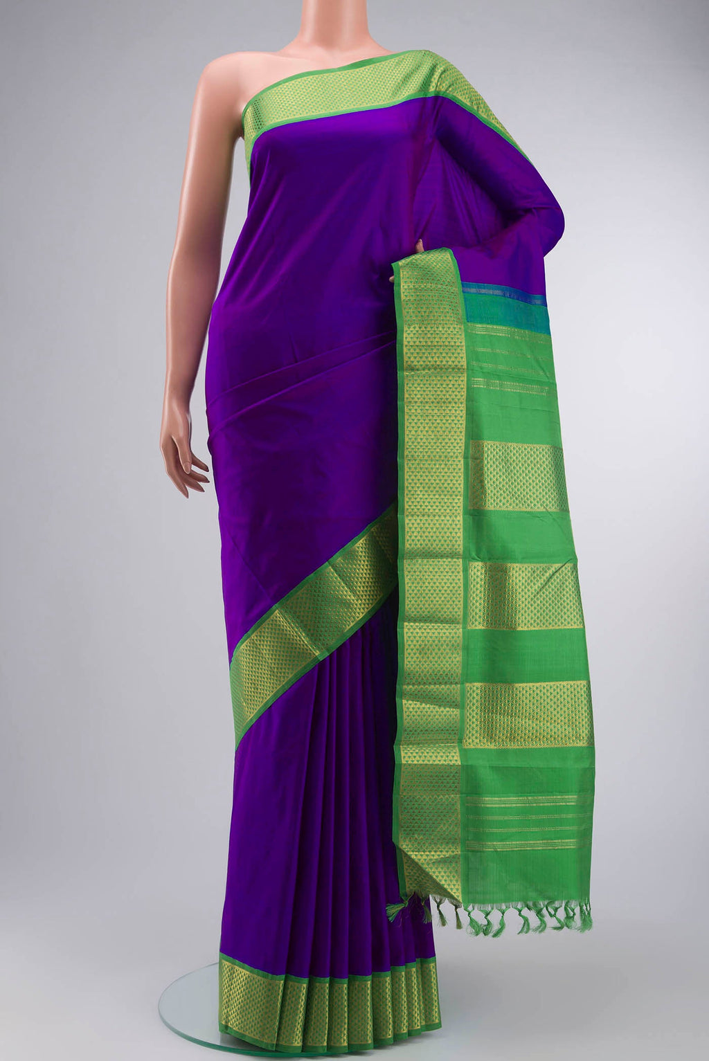 Purple Kanchipuram Silk Nine Yards Saree with Plain Body and Zari Border displayed on a mannequin
