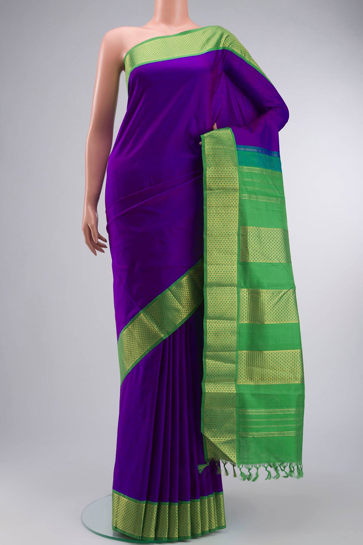 Purple Kanchipuram Silk Nine Yards Saree with Plain Body and Zari Border displayed on a mannequin