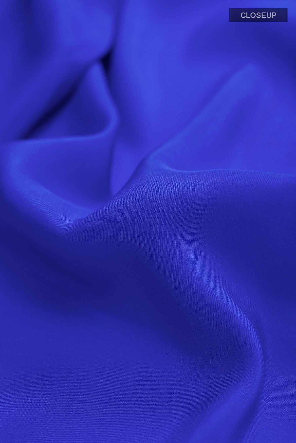 Close up of Pure Silk Pure Zari Royal Blue Mysore Crepe Saree with Plain Body and Zari Border displaying folds