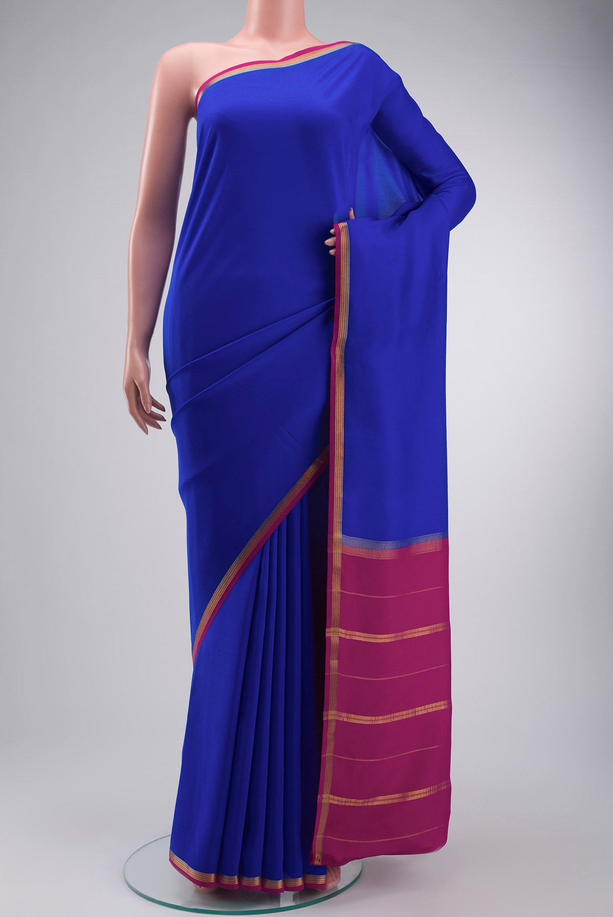 Pure Silk Pure Zari Royal Blue Mysore Crepe Saree with Plain Body and Zari Border displayed on a mannequin