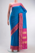Blue Bangalore Silk Saree with Plain Body and Zari Border displayed on a mannequin