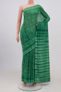 Light Green Printed Cotton Saree with Printed design on the body and Printed Border.  displayed on a mannequin
