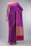 Purple Banarasi Katan Silk Saree with Zari Butta on the body and Zari Border displayed on a mannequin