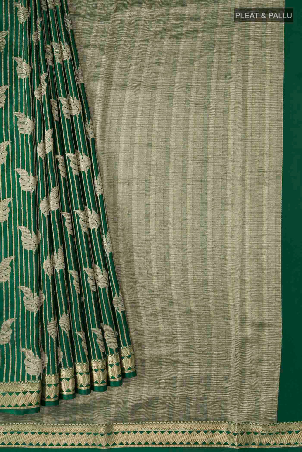 Pleats and pallu of Green Mysore Crepe Saree with Zari Butta on the body and Zari Border