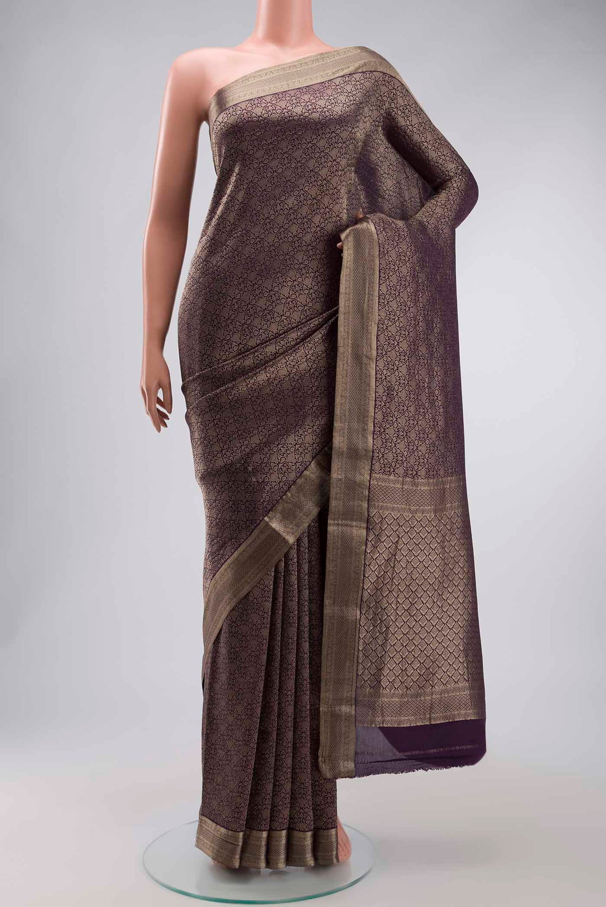Navy Blue Mysore Crepe Saree with Zari Brocade on the body and Zari Border displayed on a mannequin
