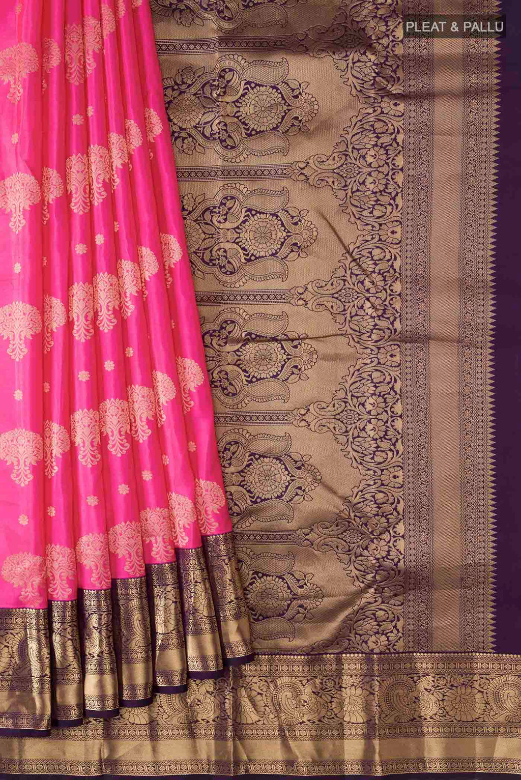 Pleats and pallu of Pink Kanchipuram Silk Saree with Zari Butta on the body and Zari Border