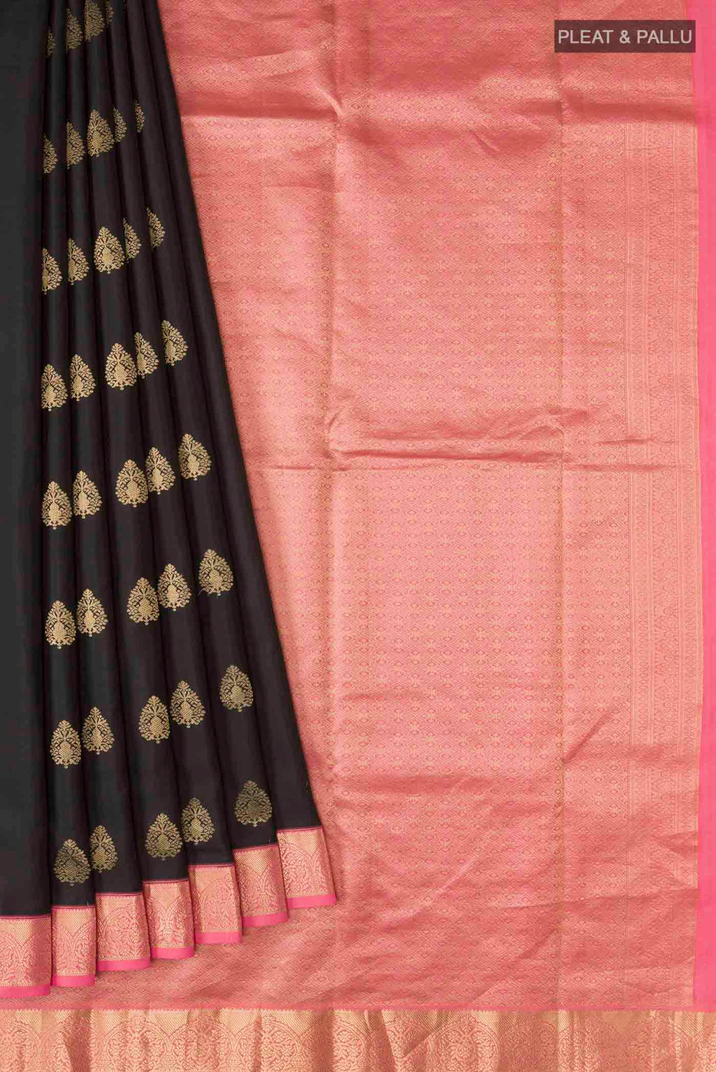 Pleats and pallu of Black Kanchipuram Silk Saree with Zari Butta on the body and Zari Border