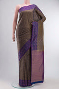 Grey Kanchipuram Silk Saree with Zari Butta on the body and Zari Border displayed on a mannequin