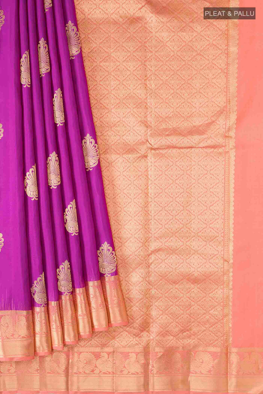 Pleats and pallu of Purple Kanchipuram Silk Saree with Zari Butta on the body and Zari Border