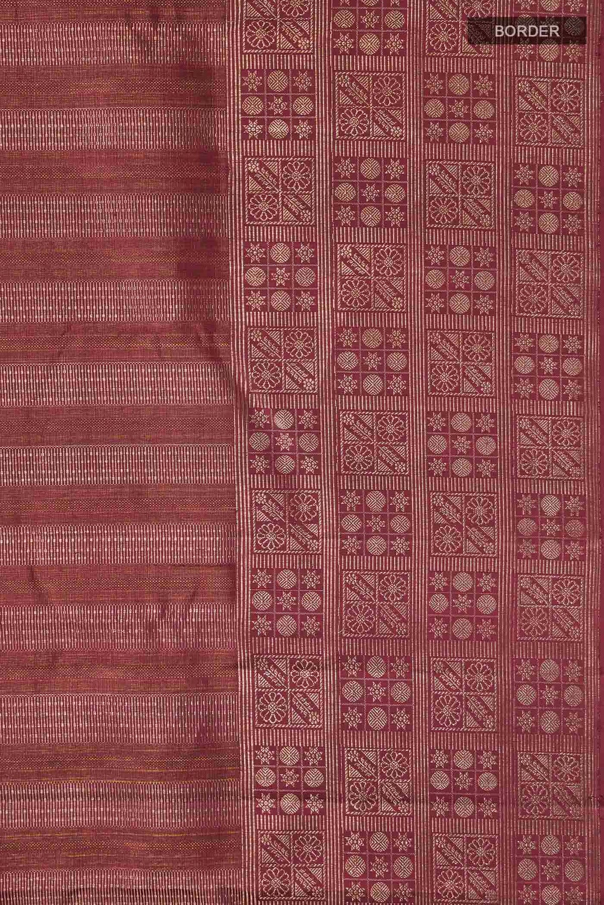 Border image of Maroon Kanchipuram Silk Saree with Zari Brocade on the body and Zari Border