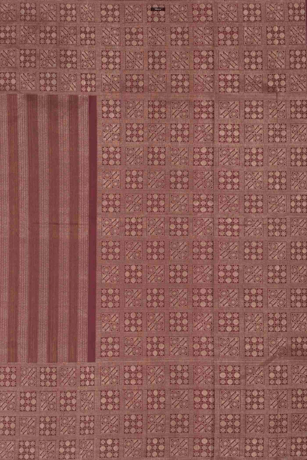 Close up image of the pallu of Maroon Kanchipuram Silk Saree with Zari Brocade on the body and Zari Border