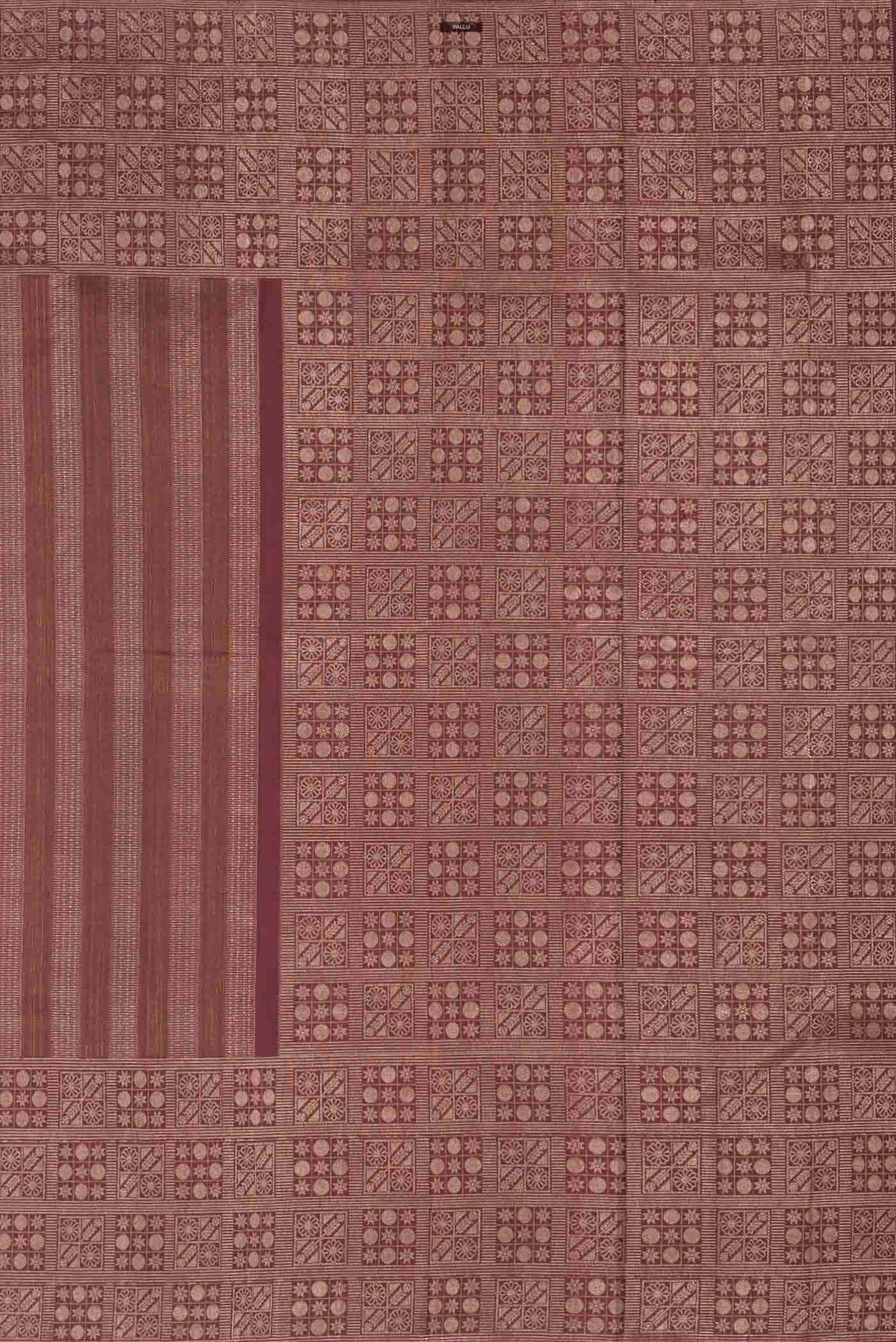 Close up image of the pallu of Maroon Kanchipuram Silk Saree with Zari Brocade on the body and Zari Border