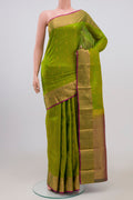 Green Kanchipuram Saree with Jacquard With Zari Butta on the body and Zari Border.  displayed on a mannequin