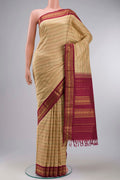 Sandal Kanchipuram Silk Saree with Veldhari on the body and Zari Border displayed on a mannequin