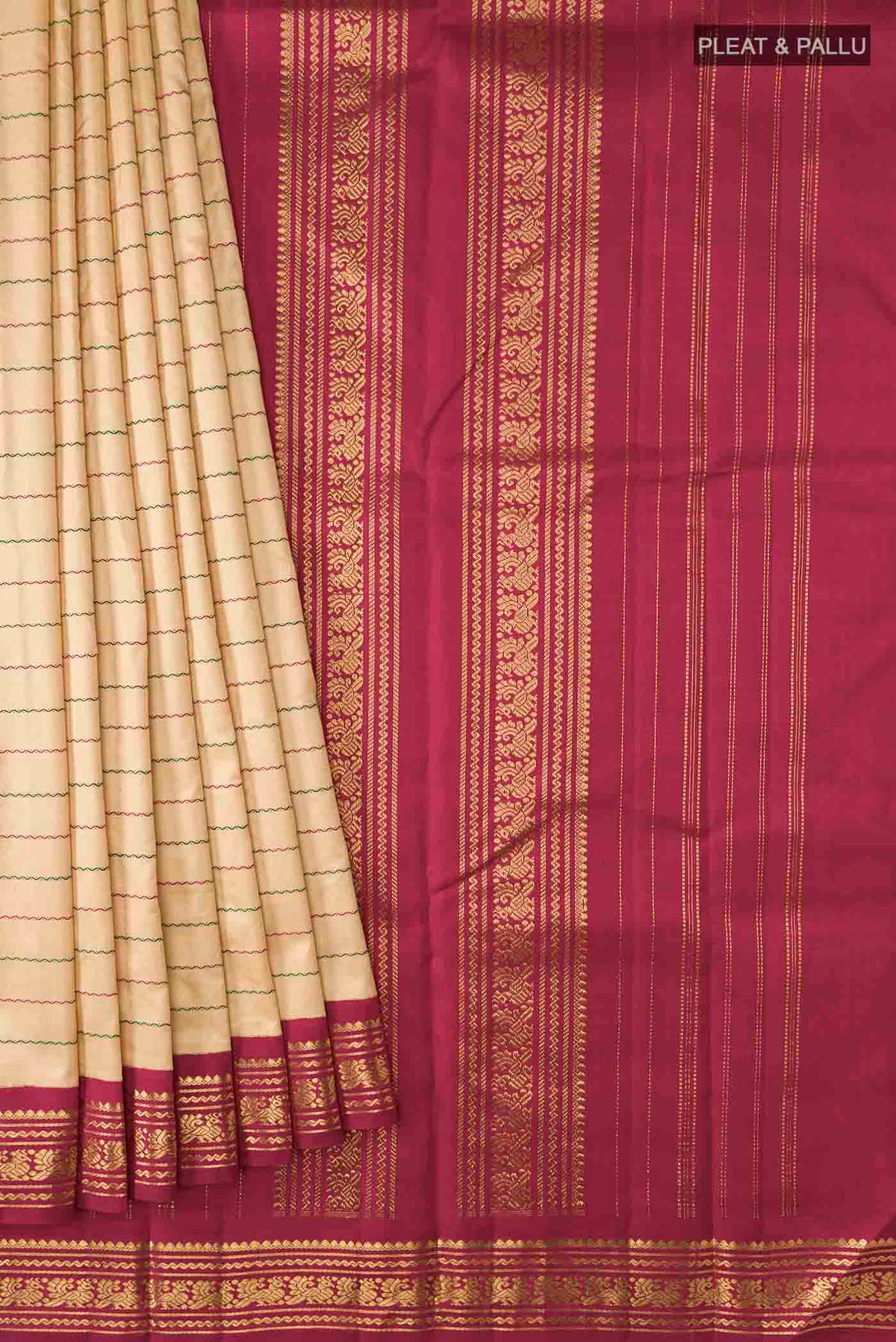 Pleats and pallu of Sandal Kanchipuram Silk Saree with Veldhari on the body and Zari Border