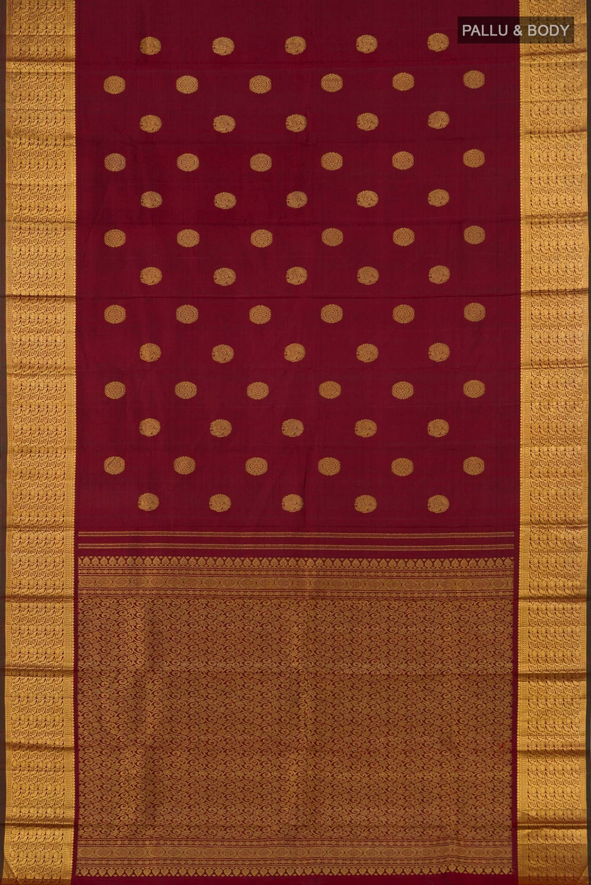 Flat view of Pure Silk Pure Zari Maroon Kanchipuram Saree with Zari Butta on the body and Zari Border. 