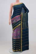 Pink Crepe Saree with Printed design on the body and Zari Border.  displayed on a mannequin