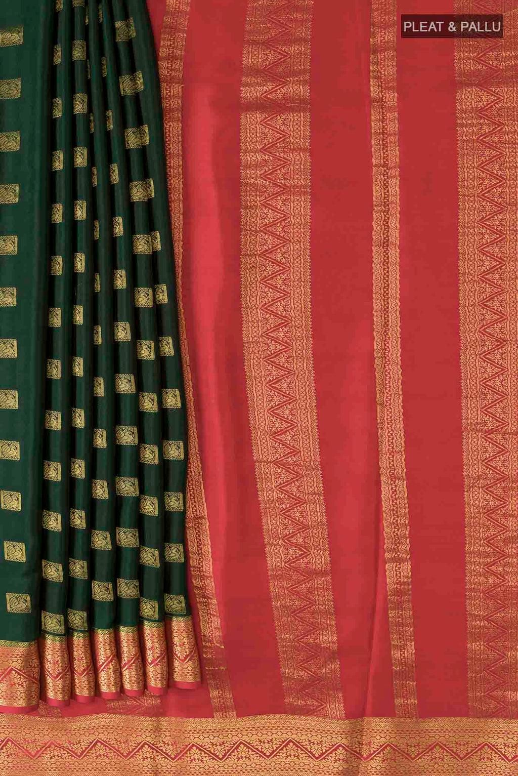 Pleats and pallu of Green Mysore Crepe Saree with Zari Butta on the body and Zari Border