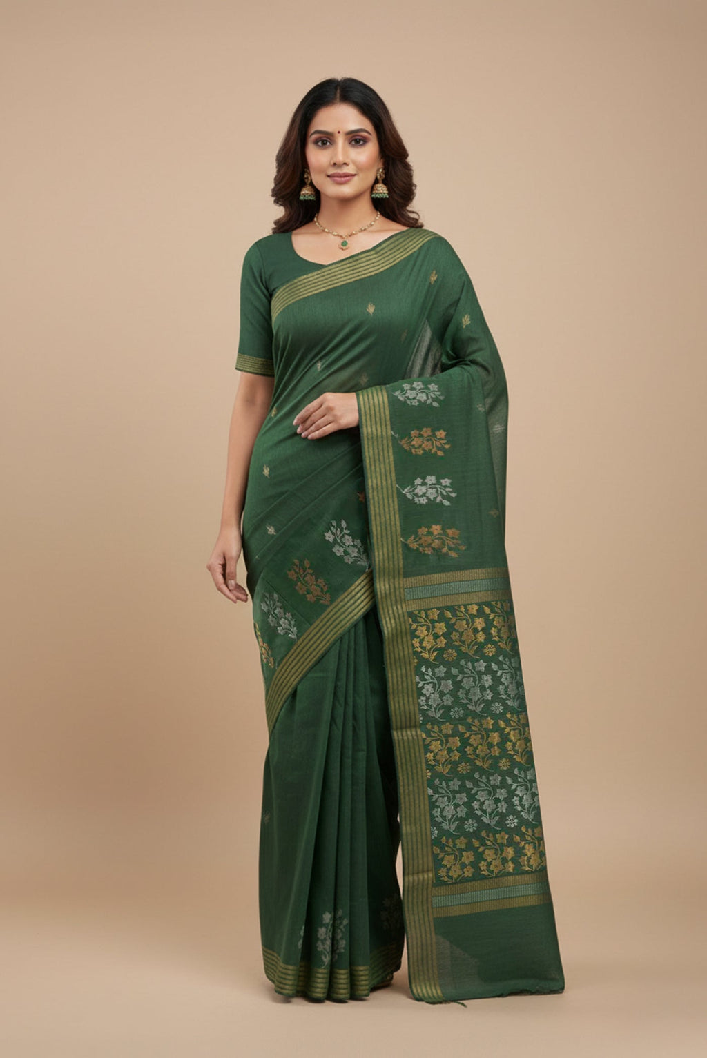 Model wearing a Sage Green Tussar Silk Saree with Zari Butta on the body and Zari Border