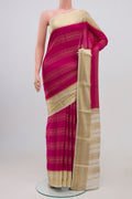 Magenta Mysore Silk Saree with Stripes on the body and Zari Border.  displayed on a mannequin