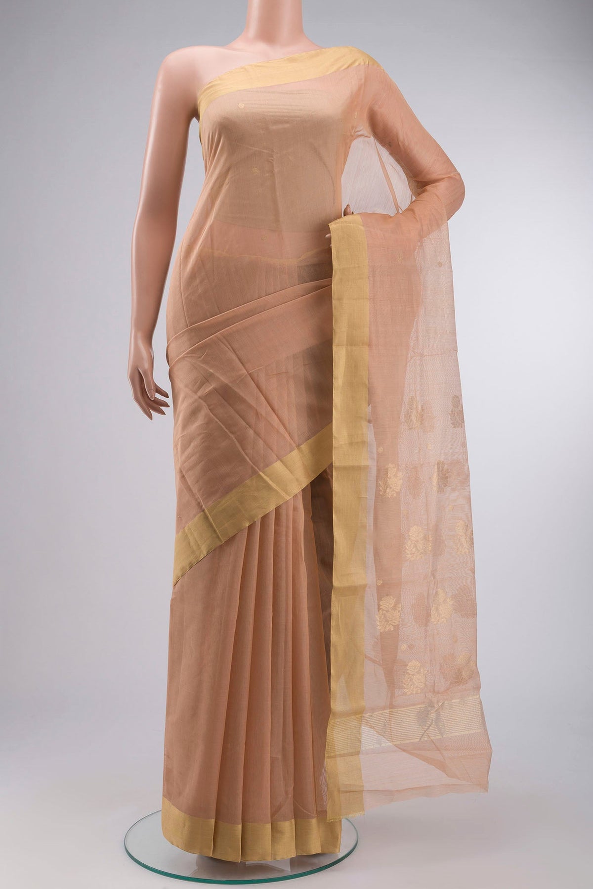 Peach Chanderi Silk Cotton Saree with Zari Butta on the body and Zari Border displayed on a mannequin