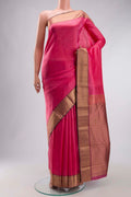 Pink Kanchipuram Silk Saree with Jacquard design on the body and Zari Border displayed on a mannequin