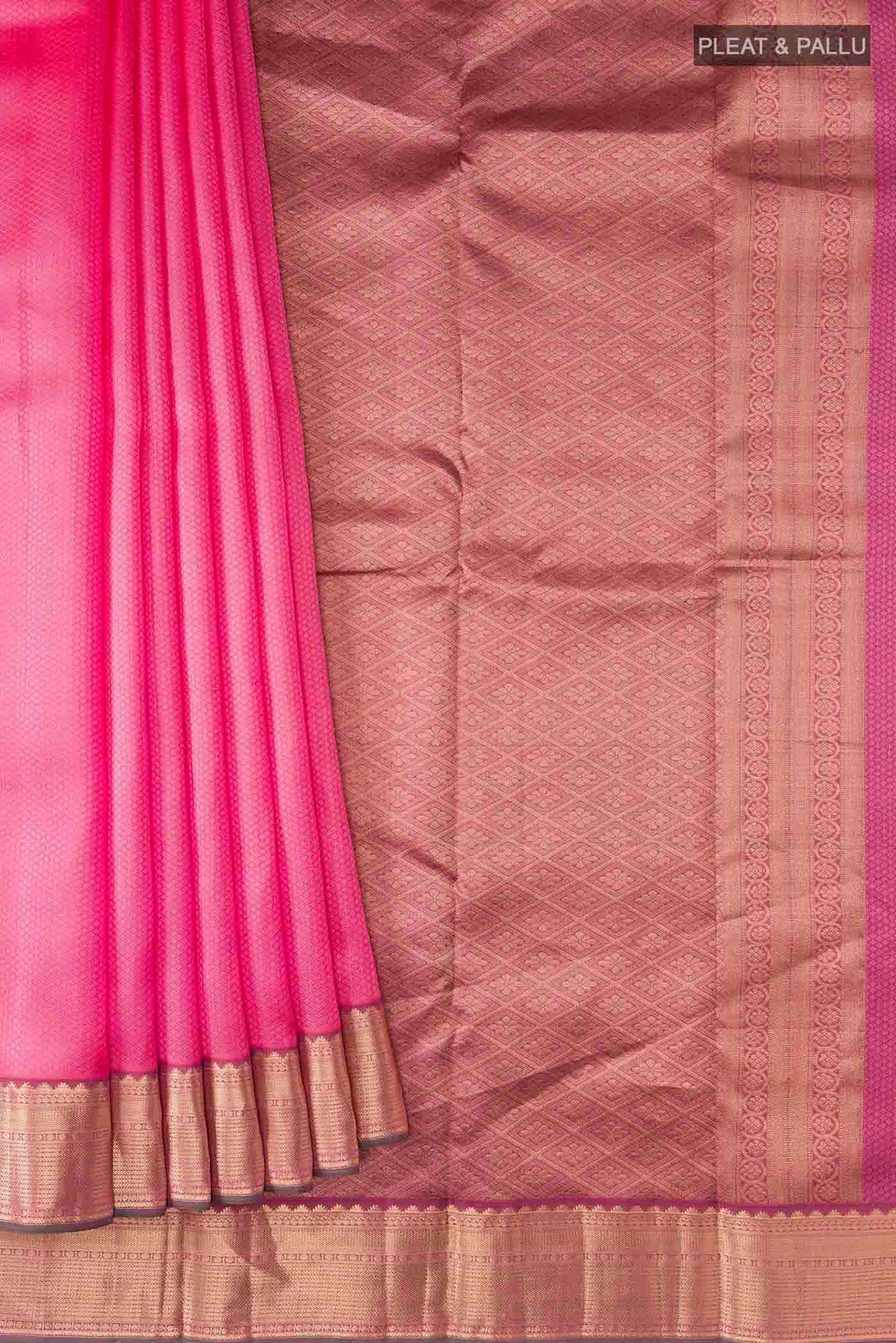 Pleats and pallu of Pink Kanchipuram Silk Saree with Jacquard design on the body and Zari Border