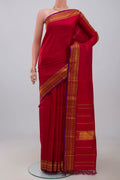Pure Silk Pure Zari Red Kanjivaram Saree with Plain Body and Zari Border.  displayed on a mannequin