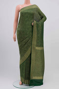 Bottle Green Mysore Crepe Saree with Zari Brocade on the body and Zari Border displayed on a mannequin