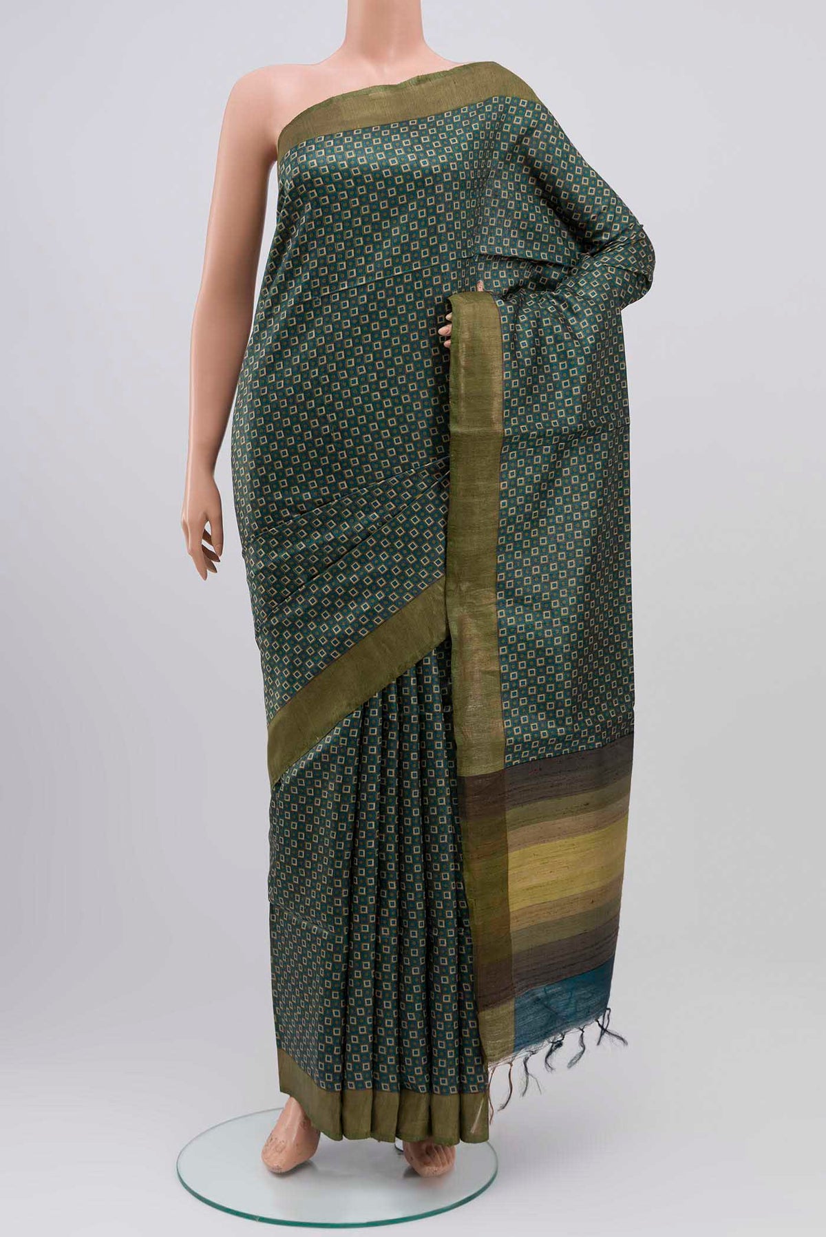 Blue Bhagalpuri Tussar Silk Saree with Printed design on the body and Zari Border displayed on a mannequin