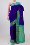 Navy Blue Narayanpet Silk Saree with Zari Butta on the body and Zari Border.  displayed on a mannequin