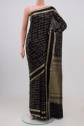 Black Mysore Silk Saree with Checked design on the body and Zari Border.  displayed on a mannequin