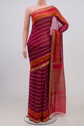 Magenta Chiffon Saree with Veldhari on the body and Zari Border.  displayed on a mannequin