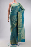 Blue Kanchipuram Silk Saree with Zari Brocade on the body and Zari Border displayed on a mannequin