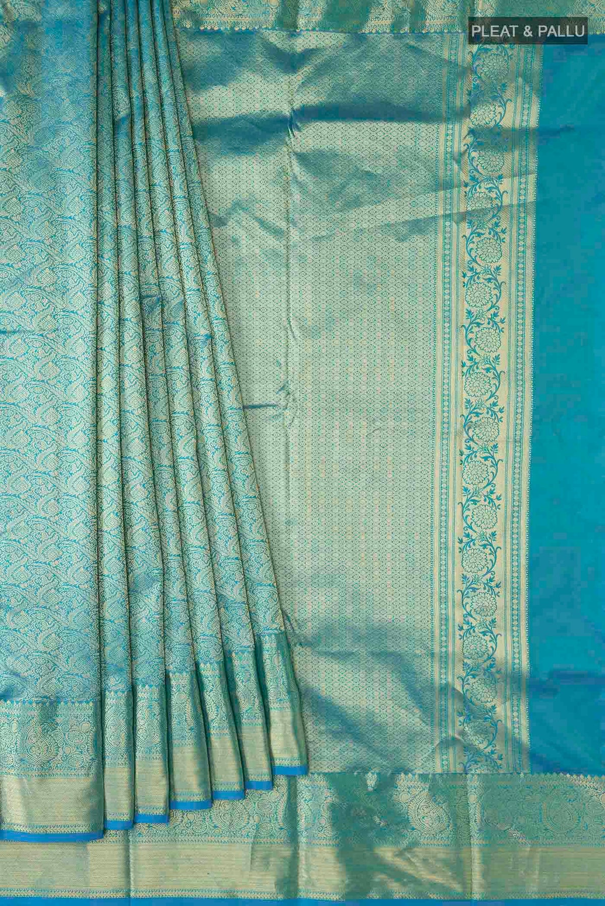 Pleats and pallu of Blue Kanchipuram Silk Saree with Zari Brocade on the body and Zari Border