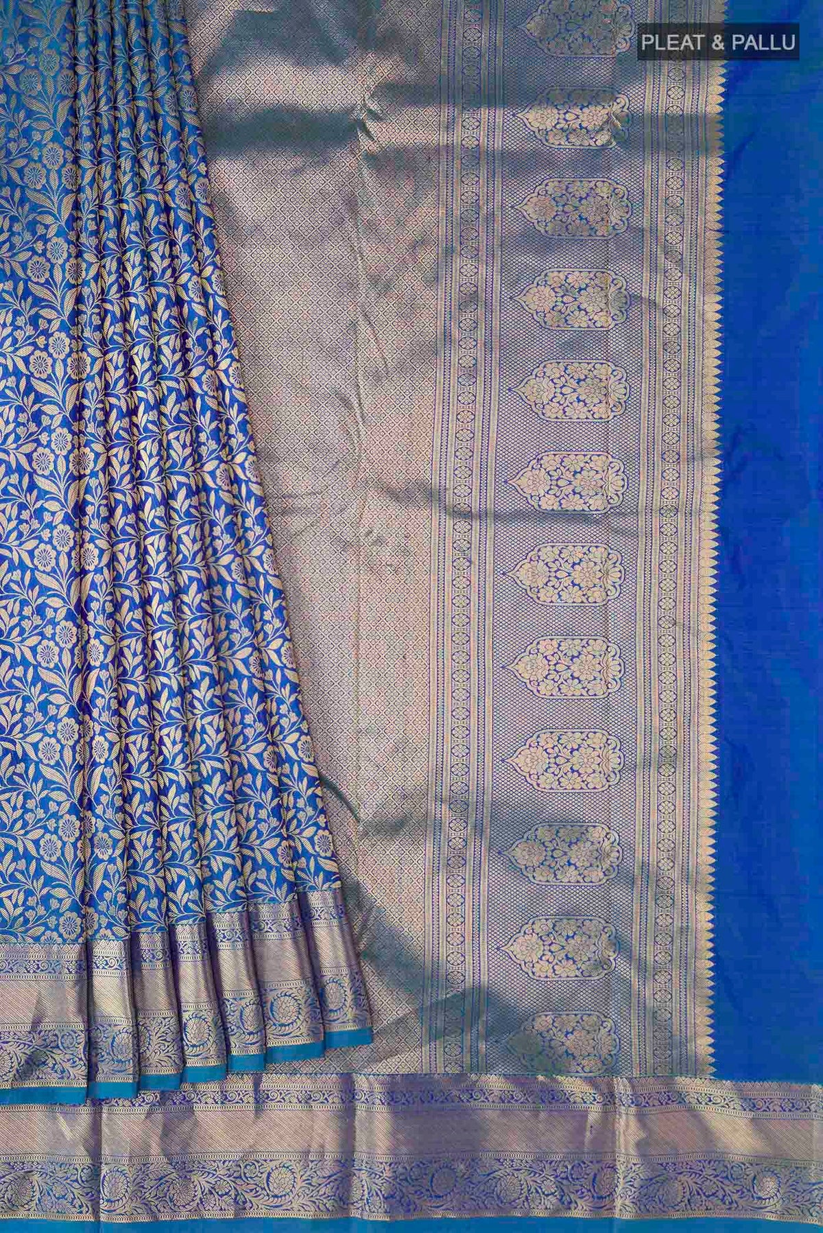 Pleats and pallu of Blue Kanchipuram Silk Saree with Zari Brocade on the body and Zari Border