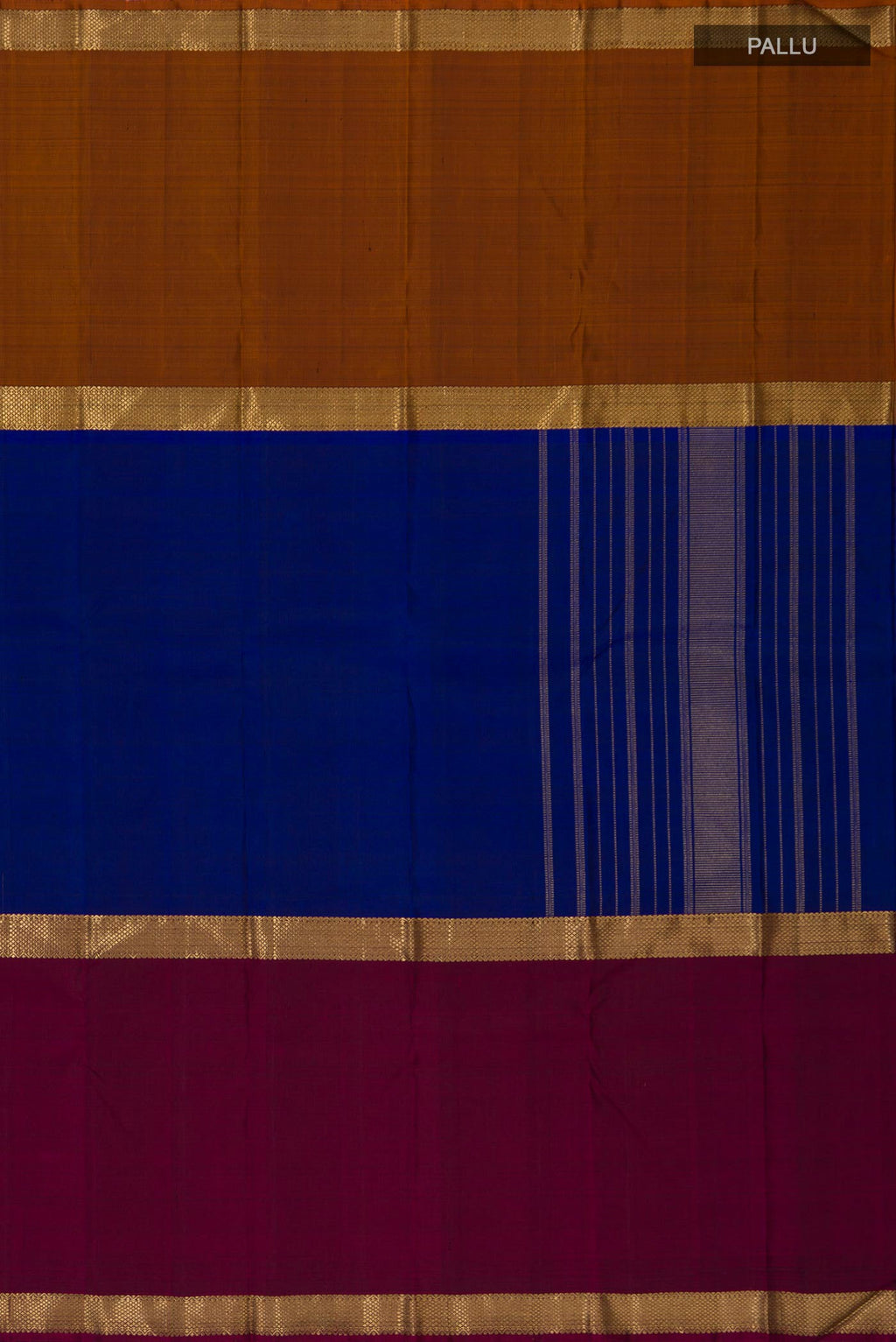 Close up image of the pallu of Pure Silk Pure Zari Blue Kanchipuram Saree with Plain Body and Ganga Jamuna Border. 