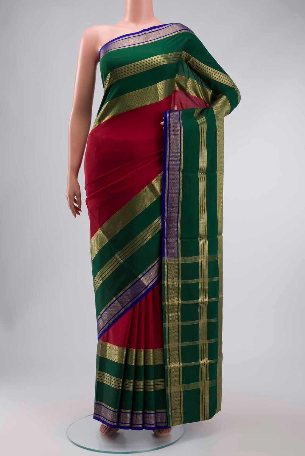 Maroon Mysore Crepe Saree with Plain Body and Zari Border displayed on a mannequin