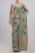 Green Tussar Silk Saree with Fancy on the body and Thin Zari Line.  displayed on a mannequin