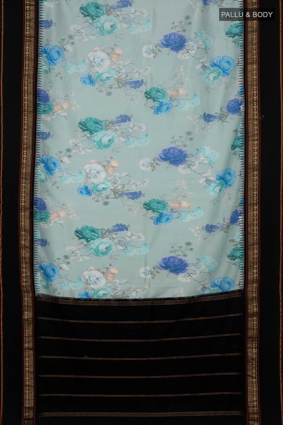 Flat view of Sky Blue Printed Silk Saree with Fancy on the body and Zari Border. 